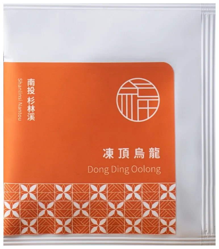 Dong Ding Oolong packaging on a transparent background