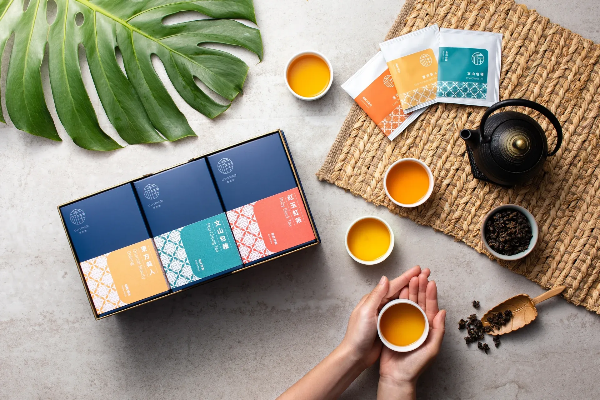 Original brand photograph of a tea setting and tea gift boxes
