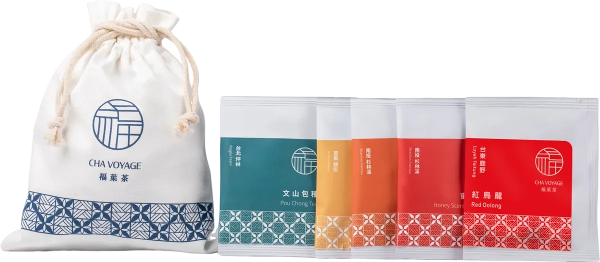 Canvas pouch and five individually packed teas on a transparent background